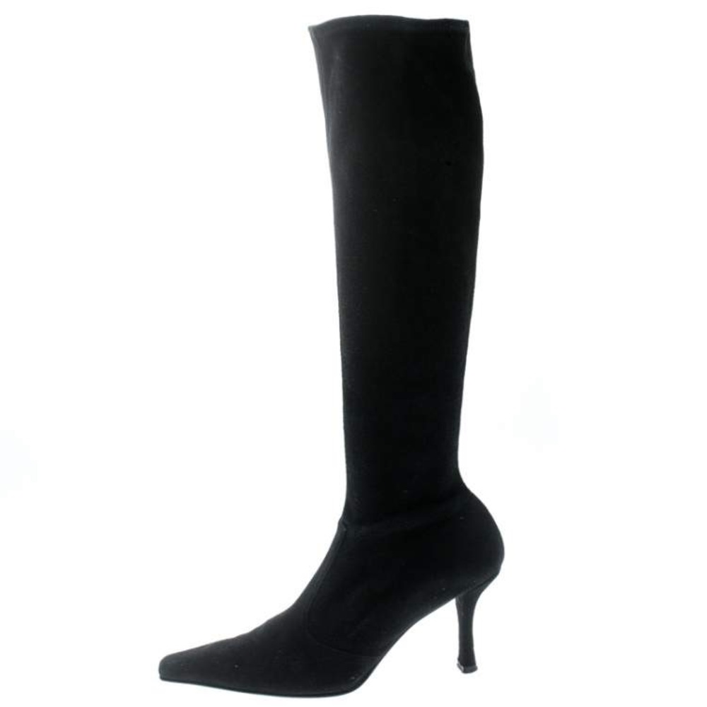 Classic Stuart Weitzman black suede low heel boot with pointed toe.